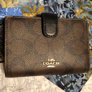 Signature Coach bifold wallet